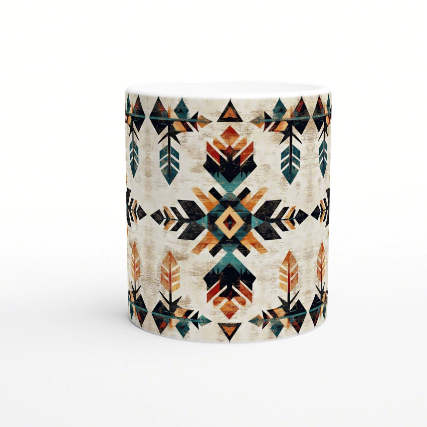 White ceramic mug with a bold geometric Aztec-inspired pattern in teal, orange, and black on a cream background.