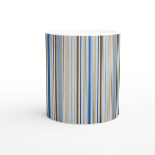 Ceramic mug with vertical blue, beige and brown stripes, white interior; product mockup for a striped cup design.