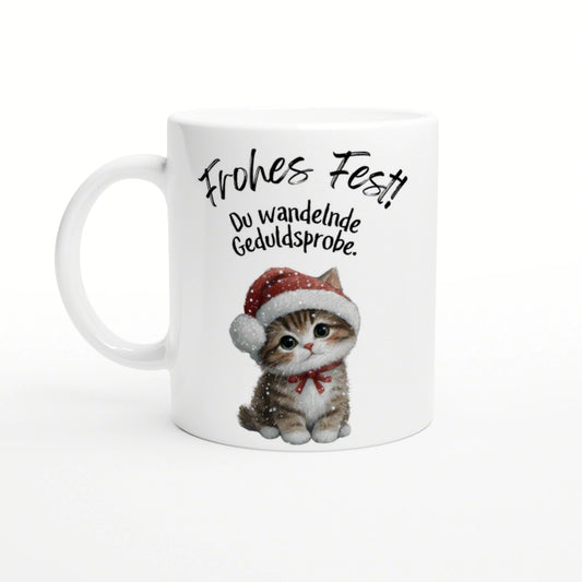 Mug mockup featuring a cute kitten in a Santa hat and the German caption 'Frohes Fest!! Du wandelnde Geduldsprobe'.