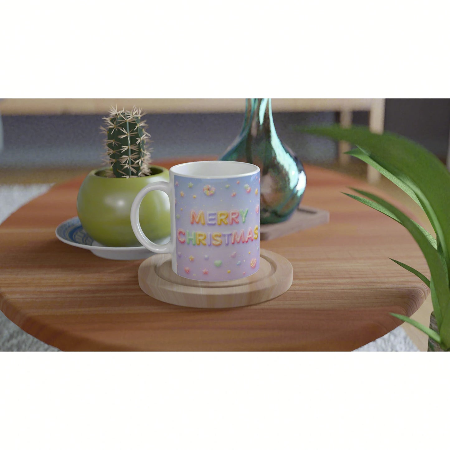 Product mockup: pastel mug with 'MERRY CHRISTMAS' lettering on a wooden coaster, set on a wooden table with nearby plants.