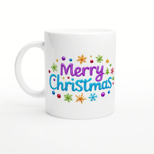 Product mockup: white ceramic mug with colorful 'Merry Christmas' lettering and multicolored snowflakes around it.
