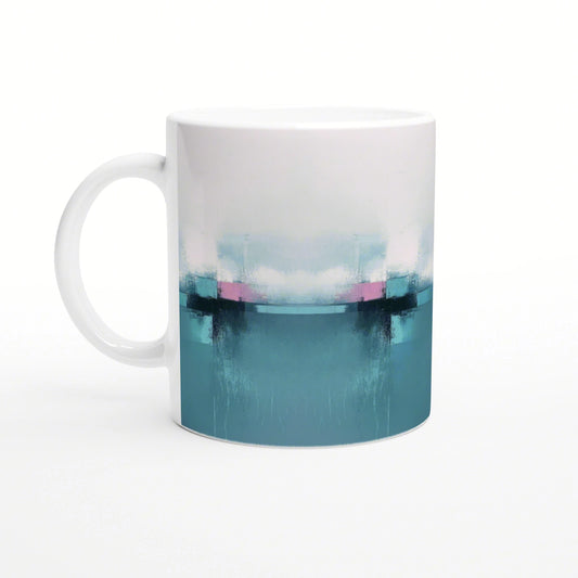 White ceramic mug with abstract gradient: teal bottom, pink stripe, and white-to-teal brushstrokes; product mockup.