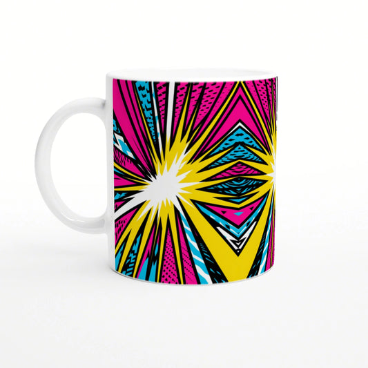 White ceramic mug with a bold pop-art explosion graphic in pink, yellow, cyan blue and black.