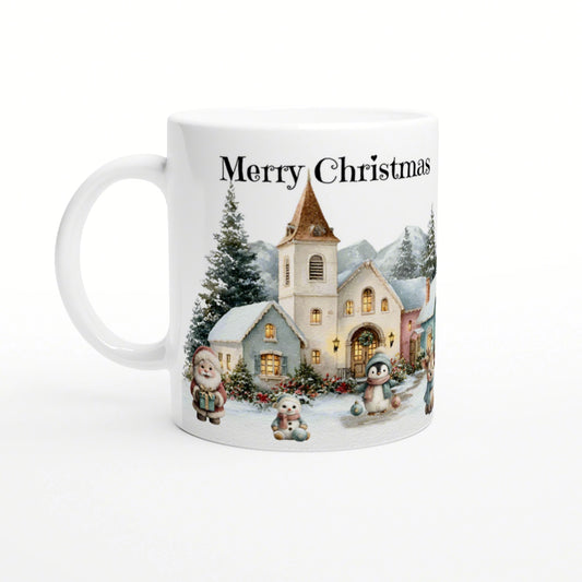 White ceramic mug featuring a snowy Christmas village scene with houses, trees, a church, and 'Merry Christmas' at the top.