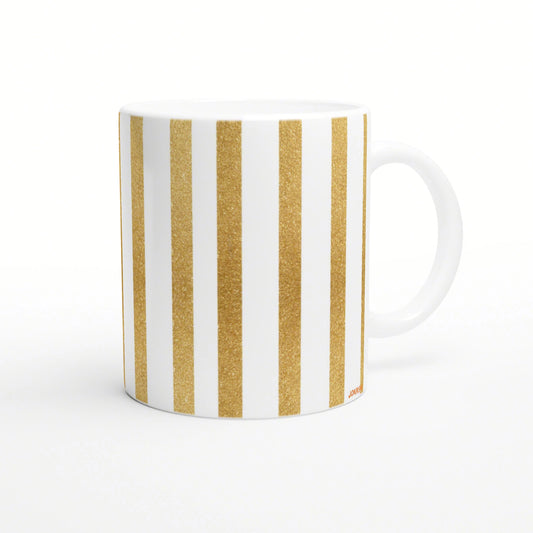 White ceramic mug with vertical gold glitter stripes; product mockup.