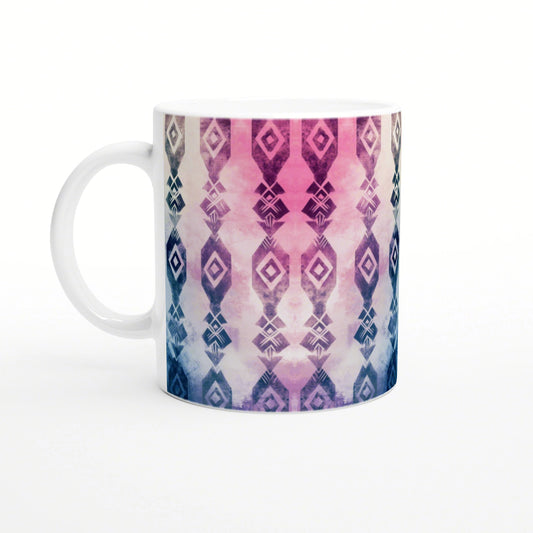 White ceramic mug with a pink-to-blue gradient and a repeating diamond geometric pattern; product mockup.