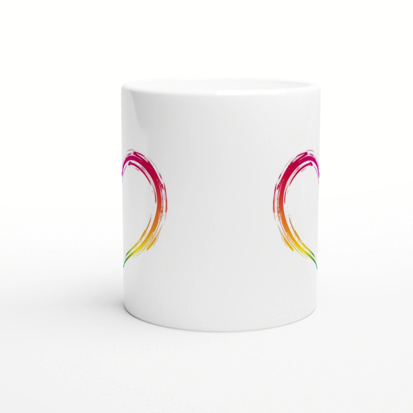 White ceramic mug with two rainbow brushstroke arcs on opposite sides; product mockup.