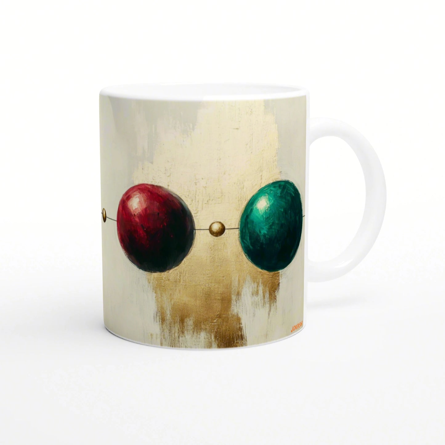 White mug with abstract art: red and teal spheres connected by a thin line on a textured beige background.