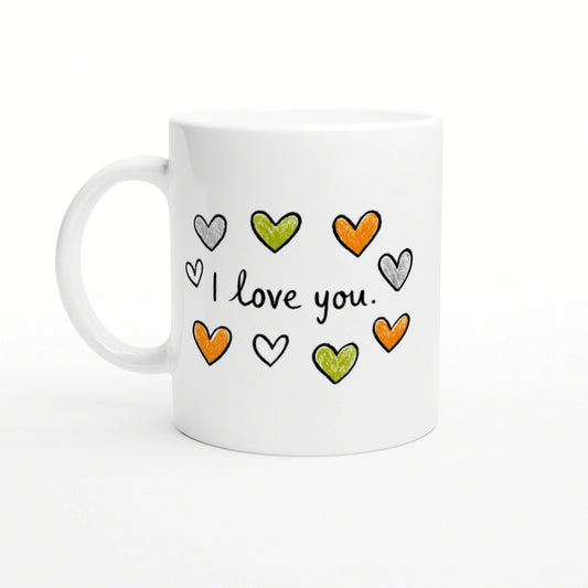 White mug featuring hand-drawn orange, green, and gray hearts around the phrase 'I love you'.