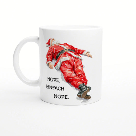White ceramic mug featuring a fallen Santa in a red suit and the caption 'NOPE. EINFACH NOPE'.