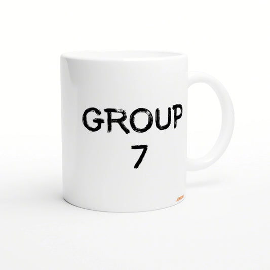 White ceramic mug with bold distressed black text GROUP 7 on the front; product mockup for a novelty mug.