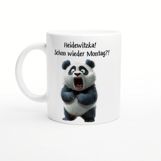 White mug mockup with a surprised panda and the German caption 'Heidewitzka! Schon wieder Montag?!'