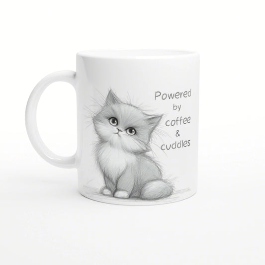 White mug with a cute pencil-drawn kitten and the caption 'Powered by coffee & cuddles'.