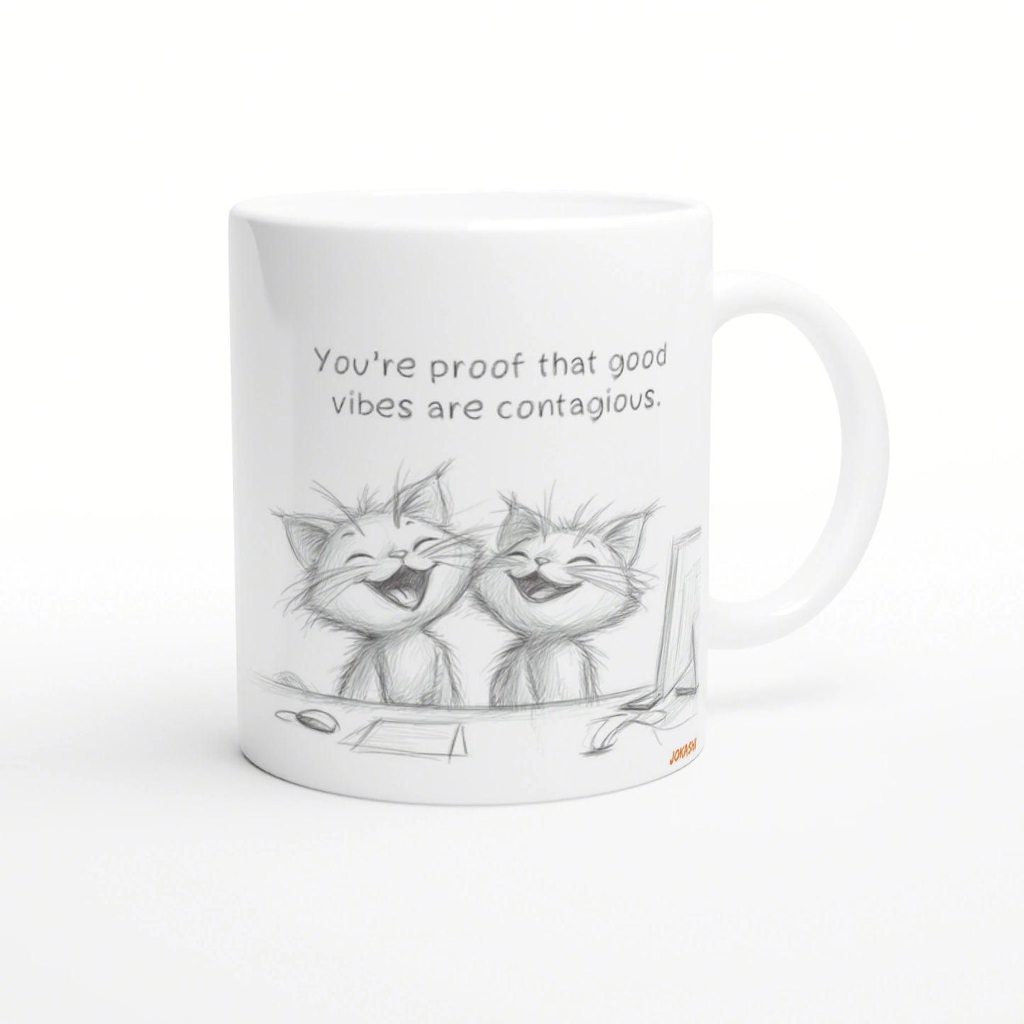 White mug featuring a pencil sketch of two laughing cats and the quote: You're proof that good vibes are contagious.