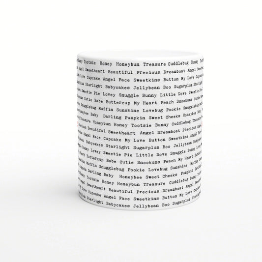 White ceramic mug with repeating black text phrases circling the surface; product mockup for humorous slogan cups.