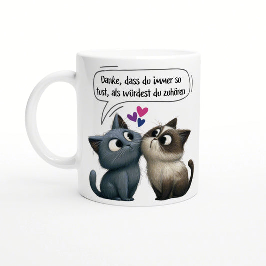White mug featuring two cute cartoon cats with a German speech bubble about listening.
