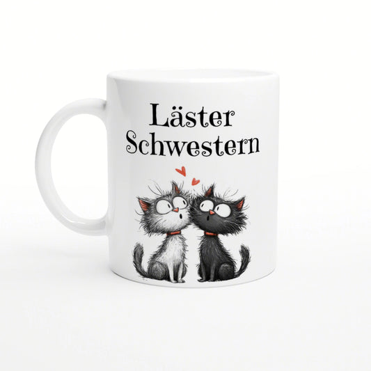 White mug mockup showing two cartoon cats facing each other with hearts and the caption Läster Schwestern.