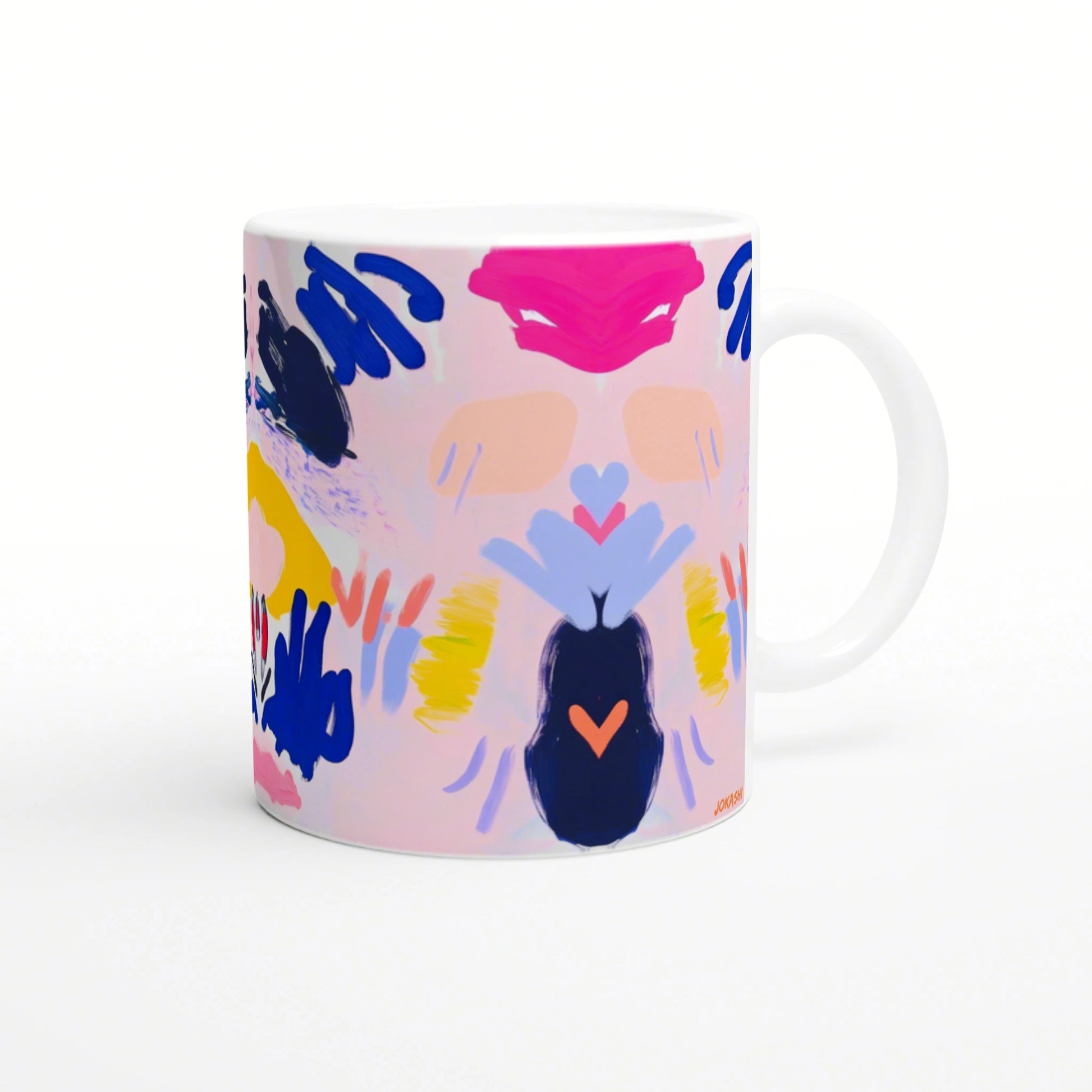Abstract colorful mug with brushstroke patterns and heart shapes; product mockup.