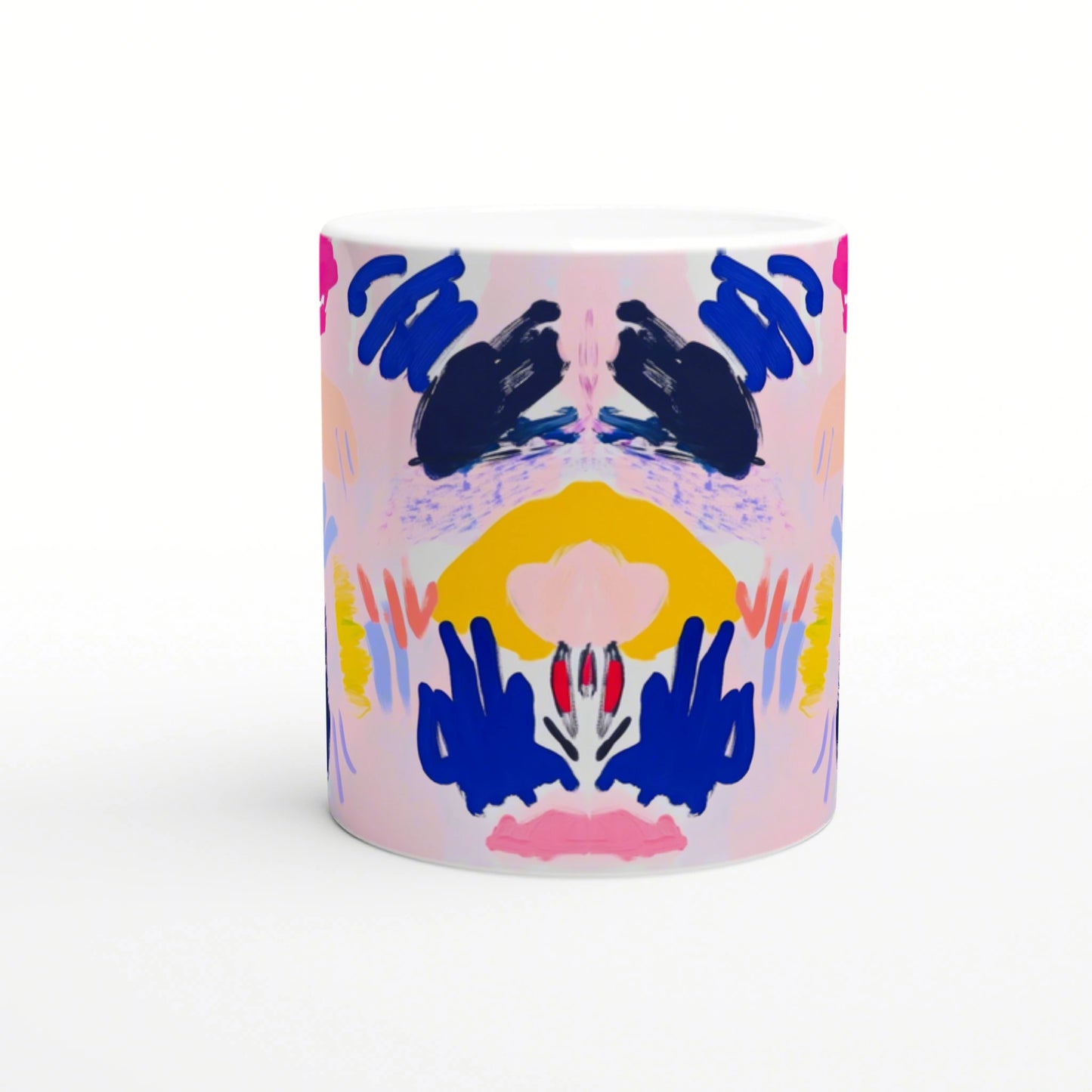 Abstract symmetrical painting on a white ceramic mug; pink backdrop with navy blue shapes, yellow arc, and pink/red accents.