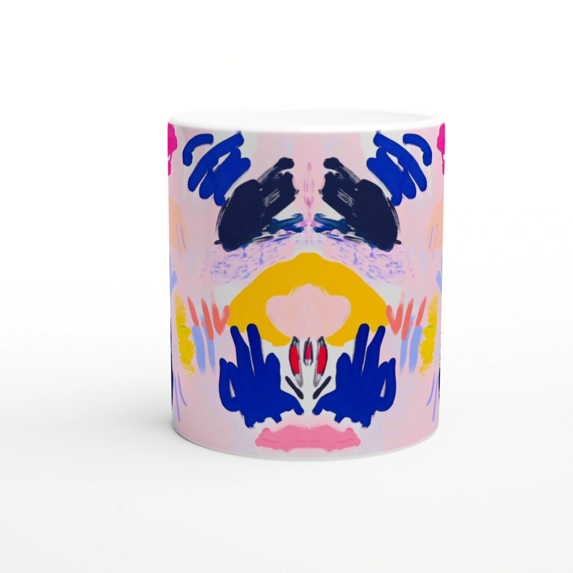 Abstract symmetrical painting on a white ceramic mug; pink backdrop with navy blue shapes, yellow arc, and pink/red accents.