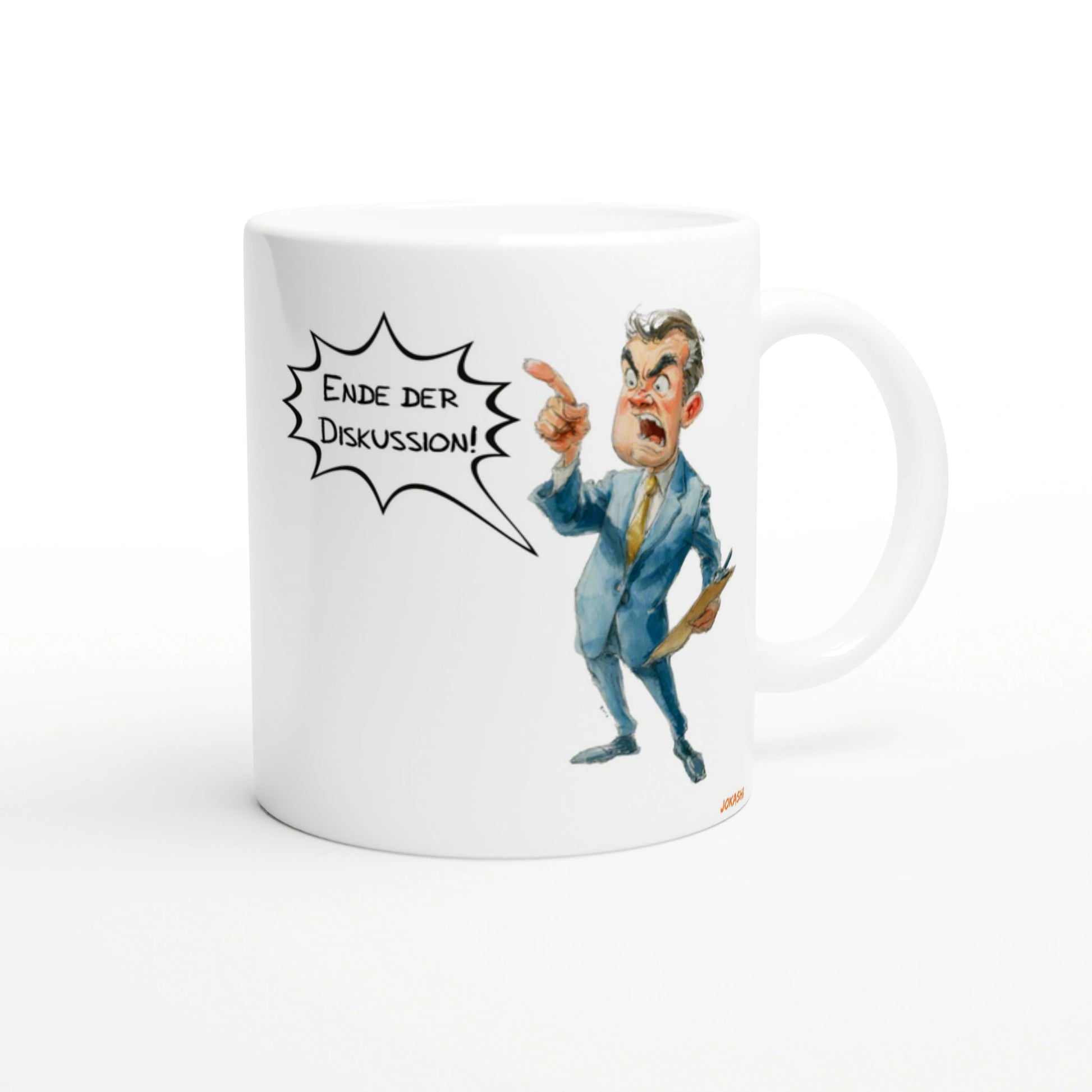 White mug featuring a cartoon businessman in a blue suit, angrily pointing, with a speech bubble reading 'Ende der Diskussion!'