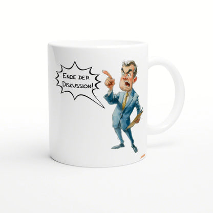 White mug featuring a cartoon businessman in a blue suit, angrily pointing, with a speech bubble reading 'Ende der Diskussion!'