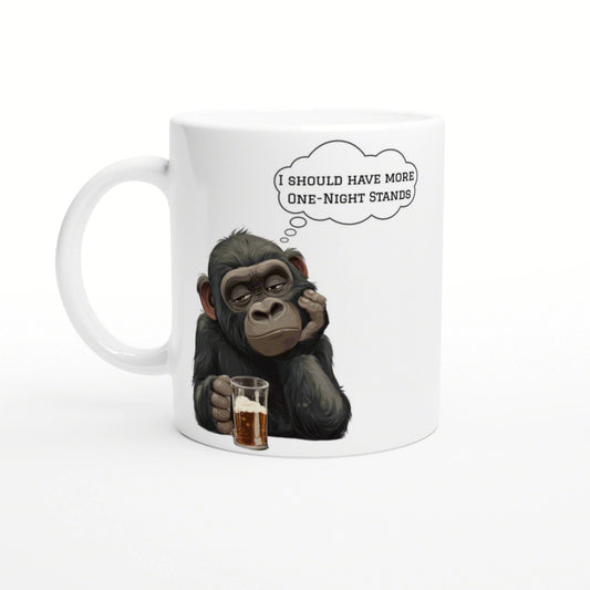 White mug featuring a cartoon chimpanzee with a beer, thinking 'I should have more One-Night Stands'.