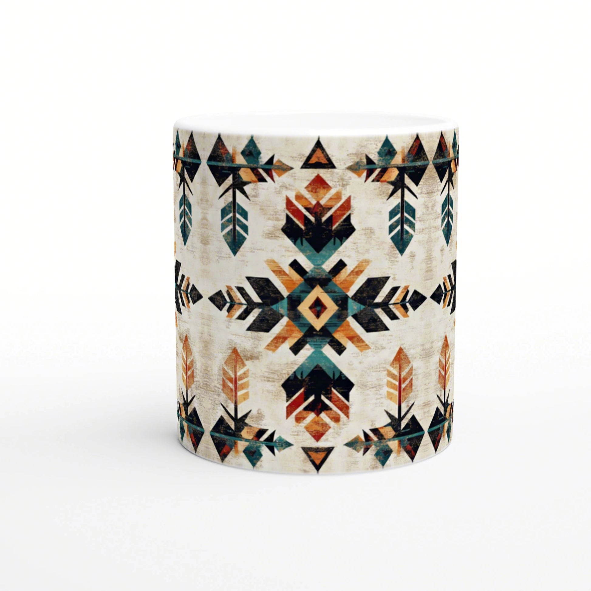 White ceramic mug with a bold geometric Aztec-inspired pattern in teal, orange, and black on a cream background.