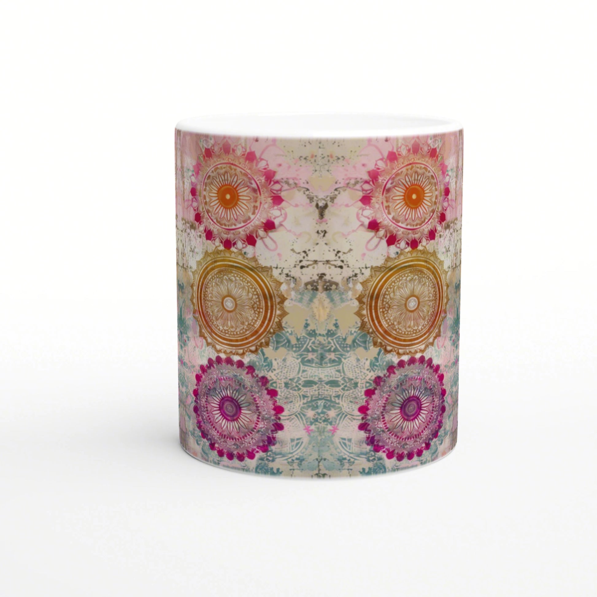Ceramic mug mockup with a wraparound colorful mandala pattern in pink, orange, purple and teal.