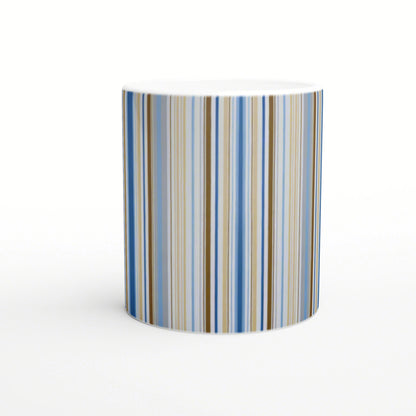 Ceramic mug with vertical blue, beige and brown stripes, white interior; product mockup for a striped cup design.