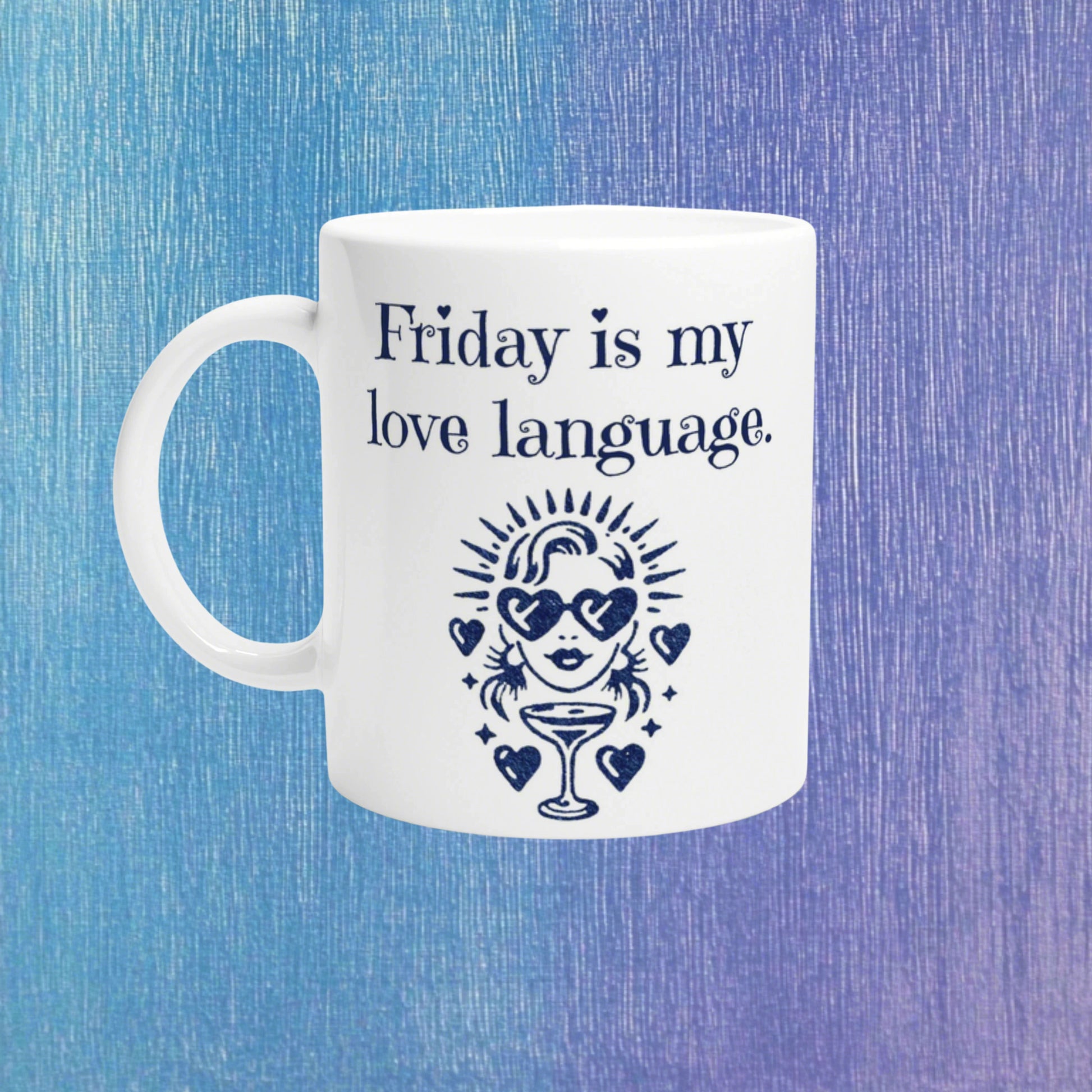 White mug with navy text Friday is my love language and a retro figure with heart sunglasses and a cocktail, on a blue background.