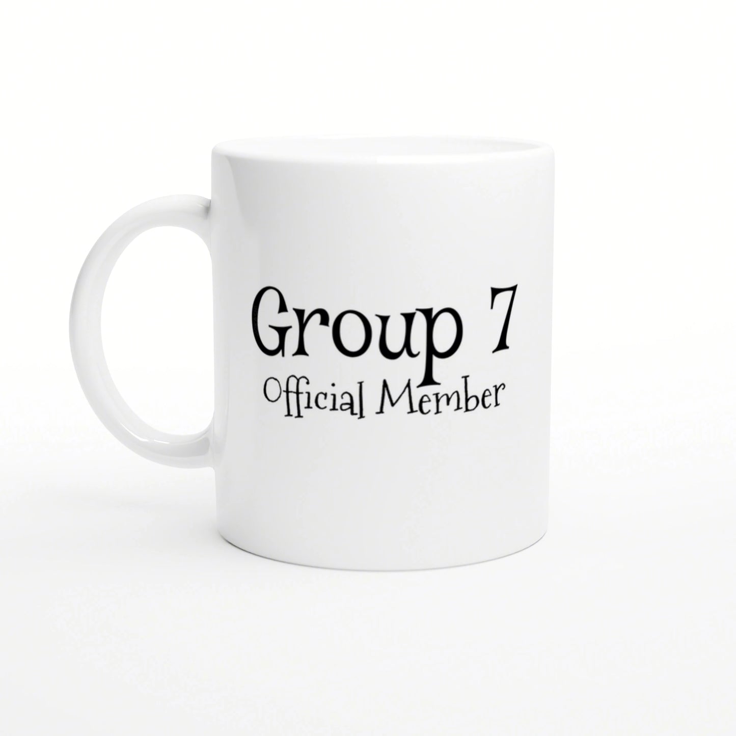 White ceramic mug displaying the text 'Group 7 Official Member' in decorative black font; product mockup.