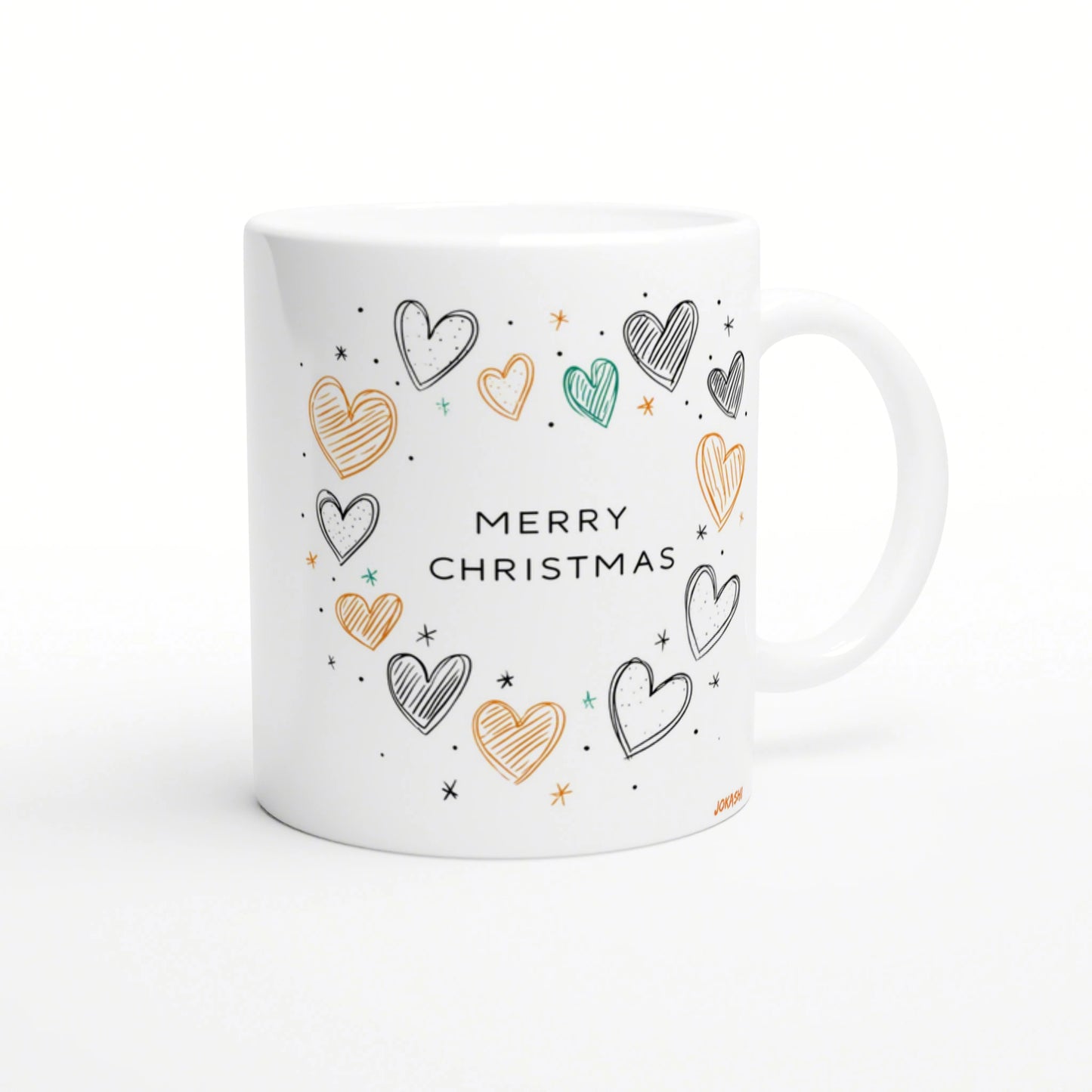 White mug mockup with 'MERRY CHRISTMAS' text surrounded by colorful hand-drawn hearts and stars in orange, teal, and black.