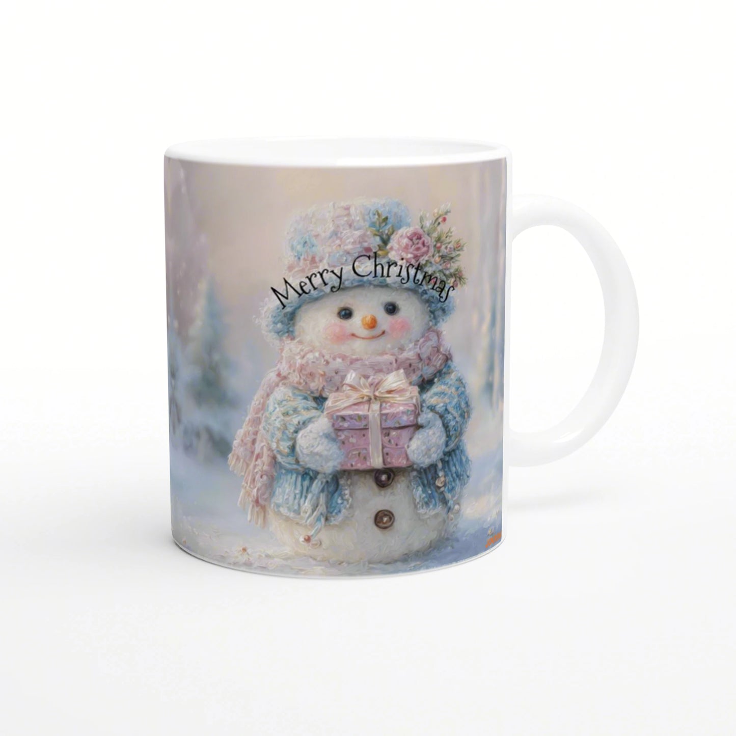 White mug featuring a cute snowman wearing a blue hat and scarf, holding a pink gift, with 'Merry Christmas' text in a snowy background.