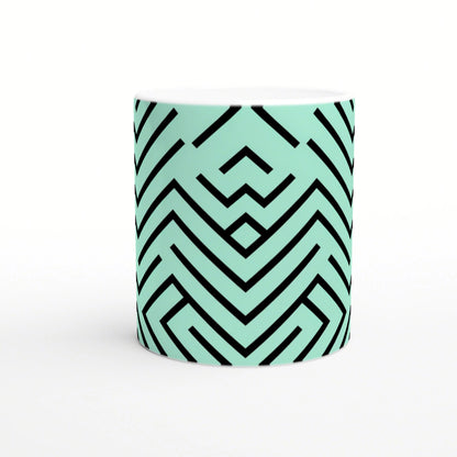 Mint-teal mug featuring a bold black chevron geometric pattern; product mockup for online shop.