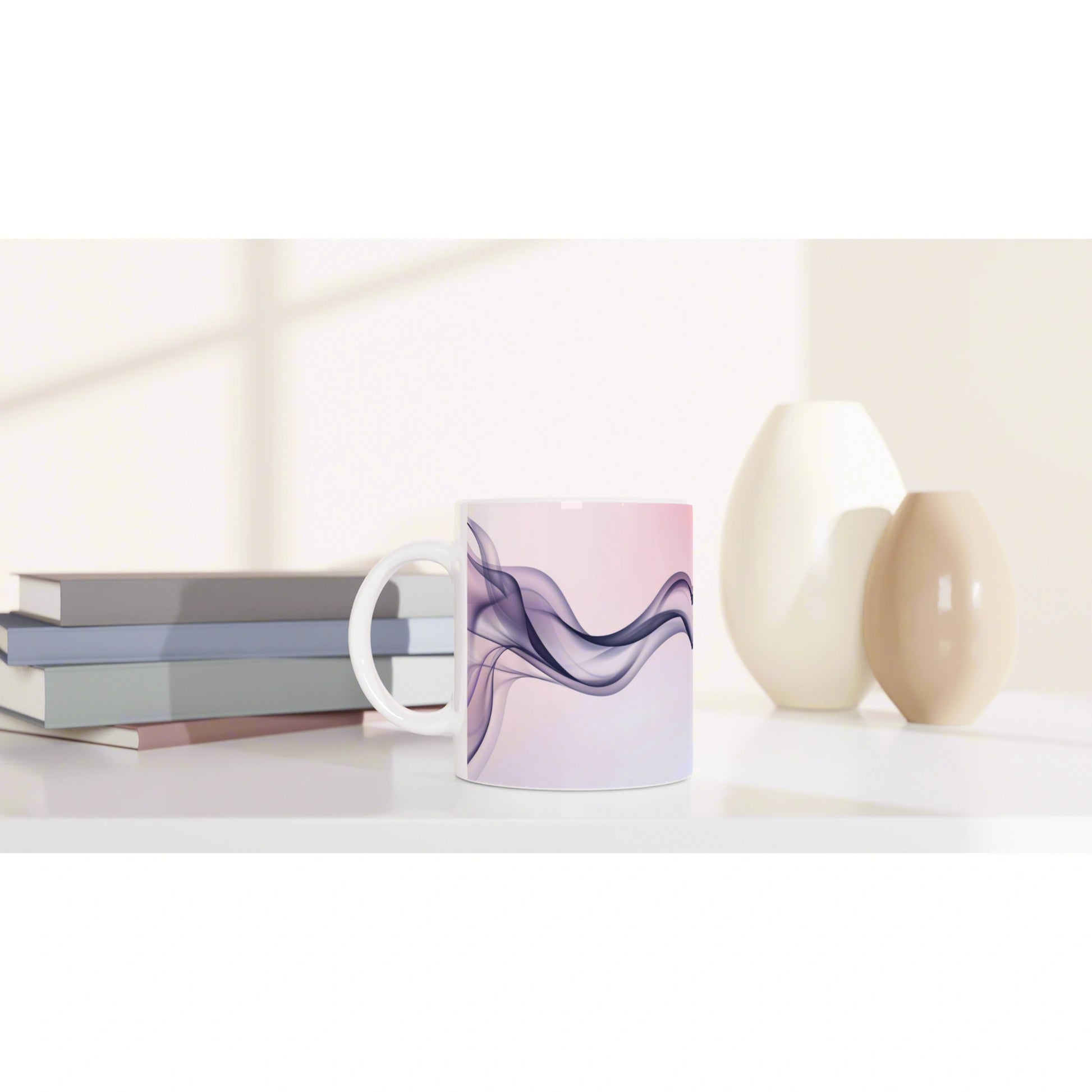 Mockup of a ceramic mug with lavender-purple abstract waves on a pink background, placed on a desk with books and vases