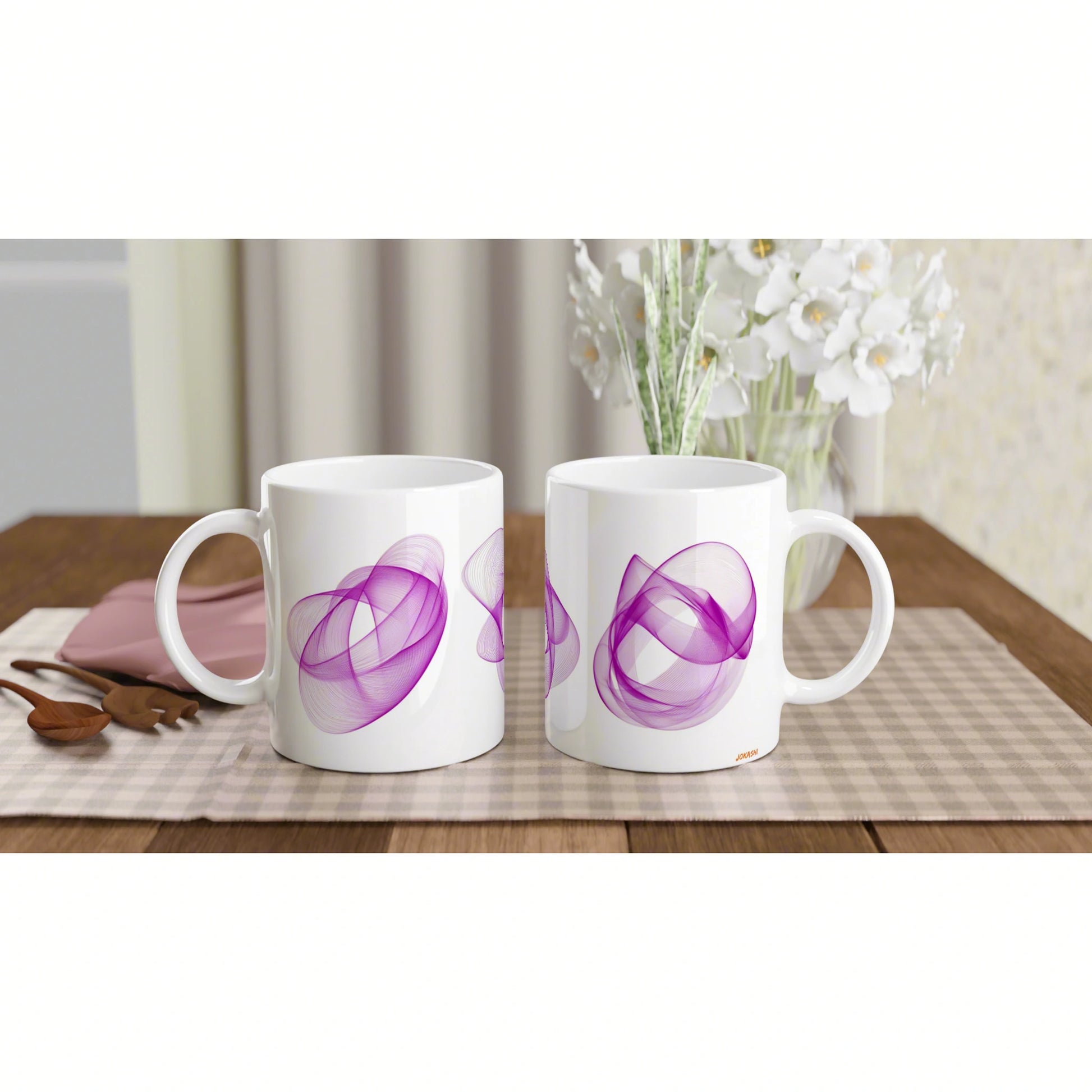 Mockup: two white ceramic mugs with purple abstract swirl designs on a wooden table, white flowers in the background.
