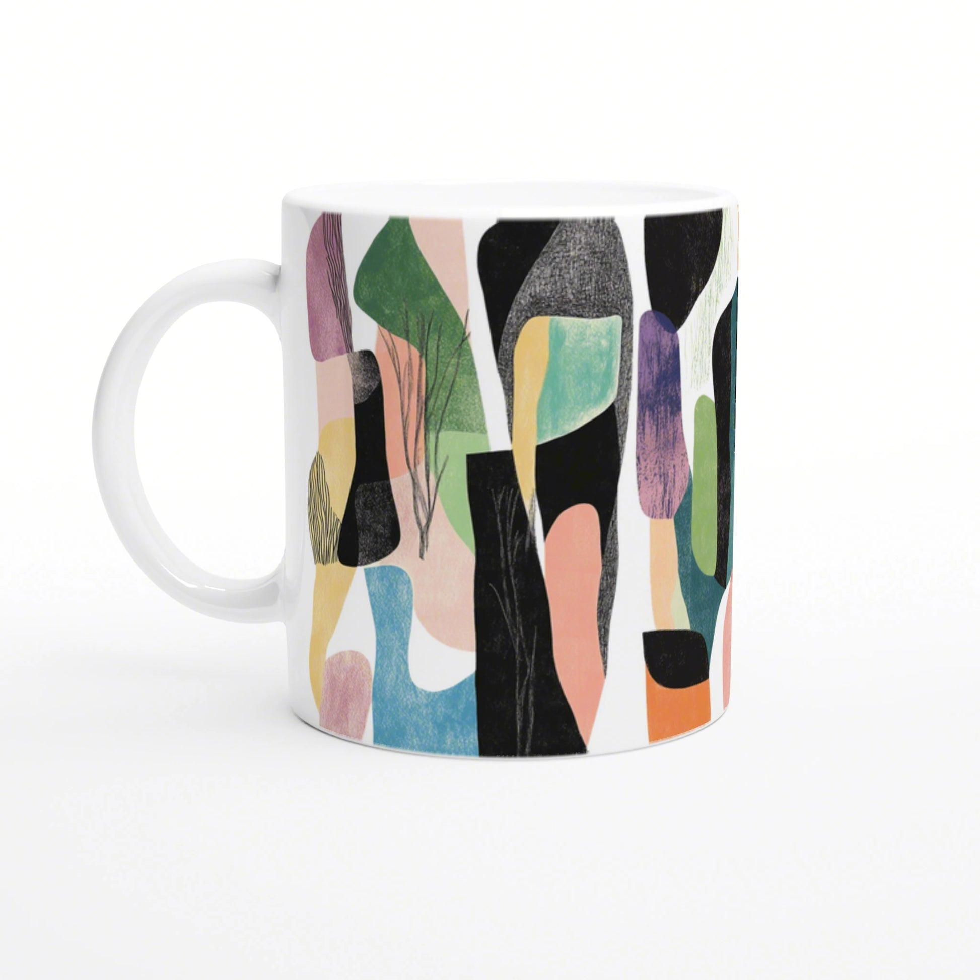 Product image: white ceramic mug with an abstract, colorful pattern of green, pink, blue and black shapes.