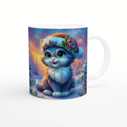 Mug with a cute blue kitten wearing a red Christmas hat with holly in a vibrant snowy winter scene.