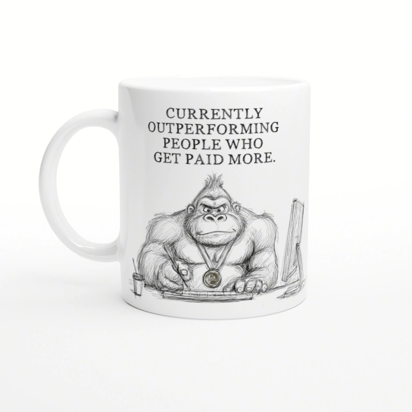 White mug featuring a pencil sketch of a muscular gorilla at a desk, wearing a medal; slogan: Currently outperforming people.