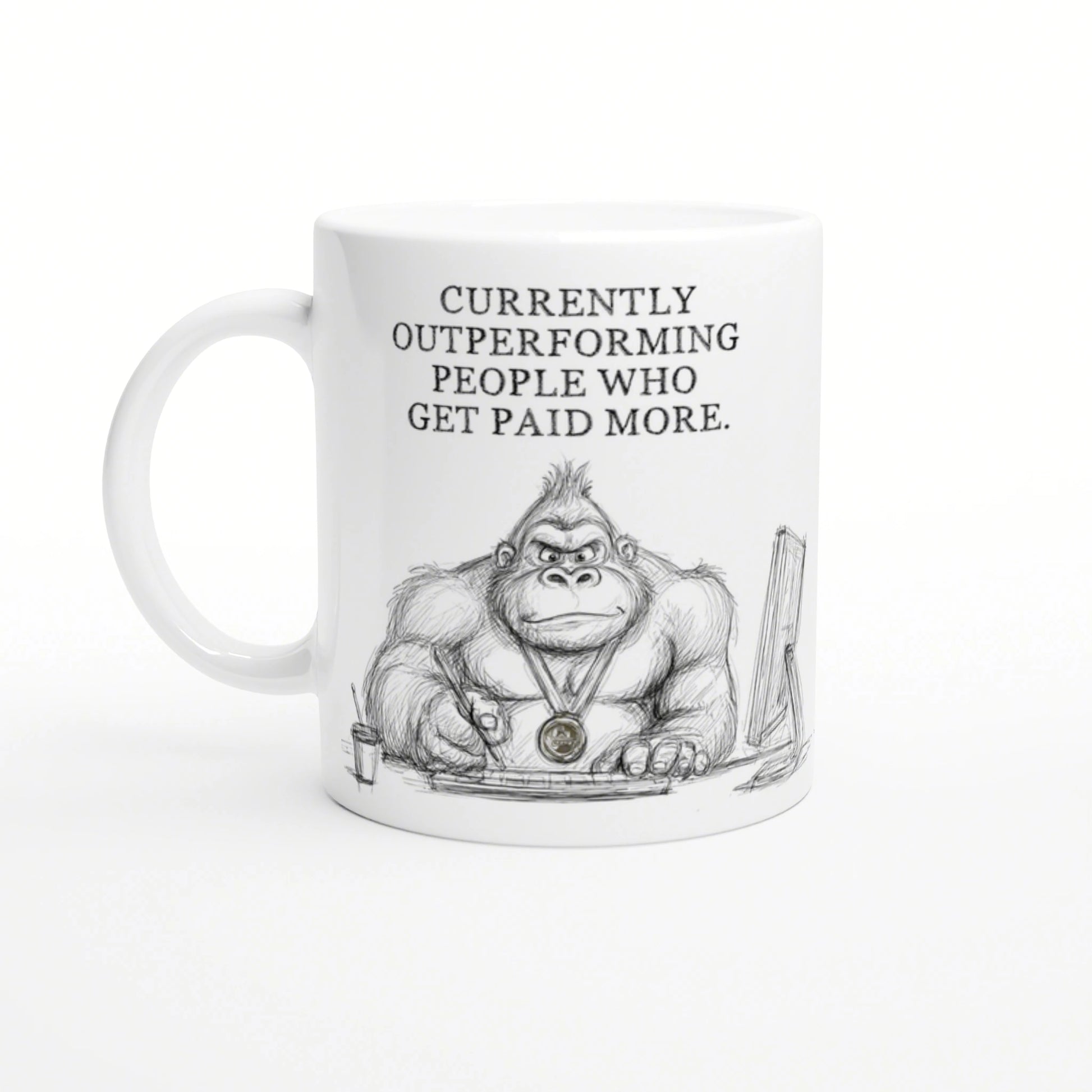 White mug featuring a pencil sketch of a muscular gorilla at a desk, wearing a medal; slogan: Currently outperforming people.