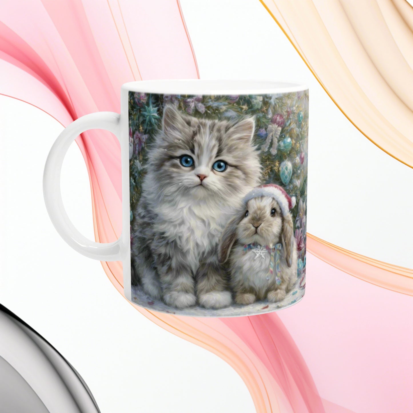 White ceramic mug with a fluffy gray kitten and a bunny in a festive Christmas scene.