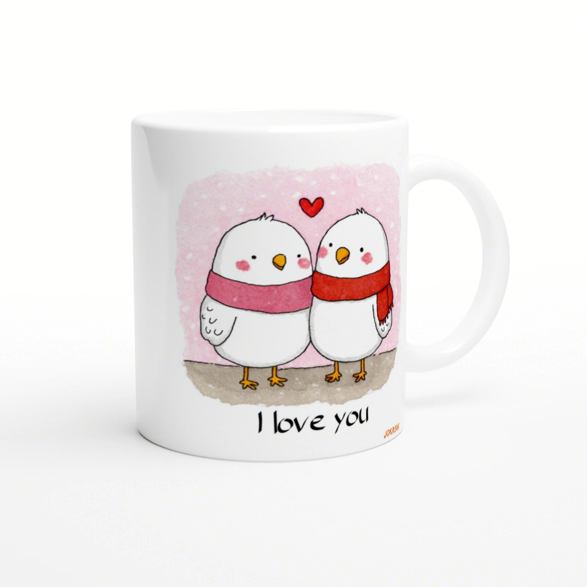 Mug featuring two white birds wearing scarves, pink background, hearts, and I love you text.