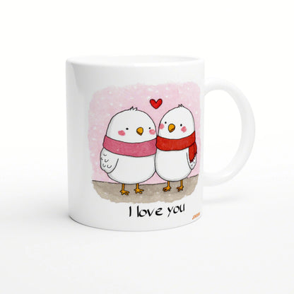 Mug featuring two white birds wearing scarves, pink background, hearts, and I love you text.