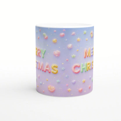 Pastel gradient mug with a wraparound candy-letter design spelling MERRY CHRISTMAS and small star and heart accents.