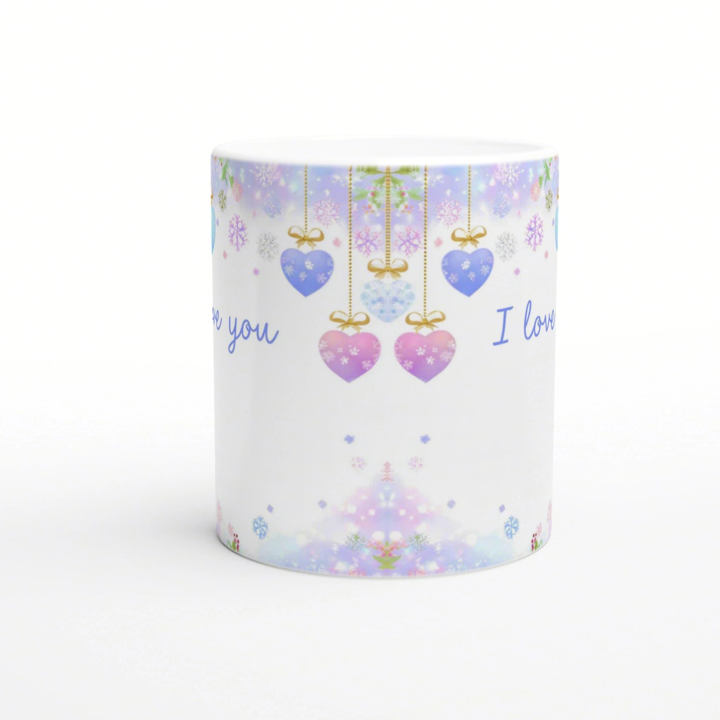Product mug with pastel holiday pattern: hanging heart ornaments, snowflakes, and 'I love you' text on white background.