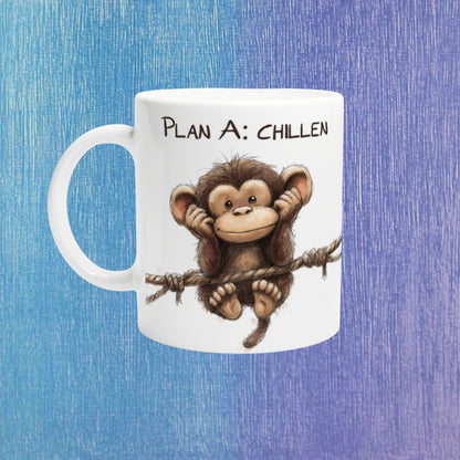 White ceramic mug mockup featuring a cartoon chimp hanging on a rope beneath the text 'Plan A: CHILLEN'.