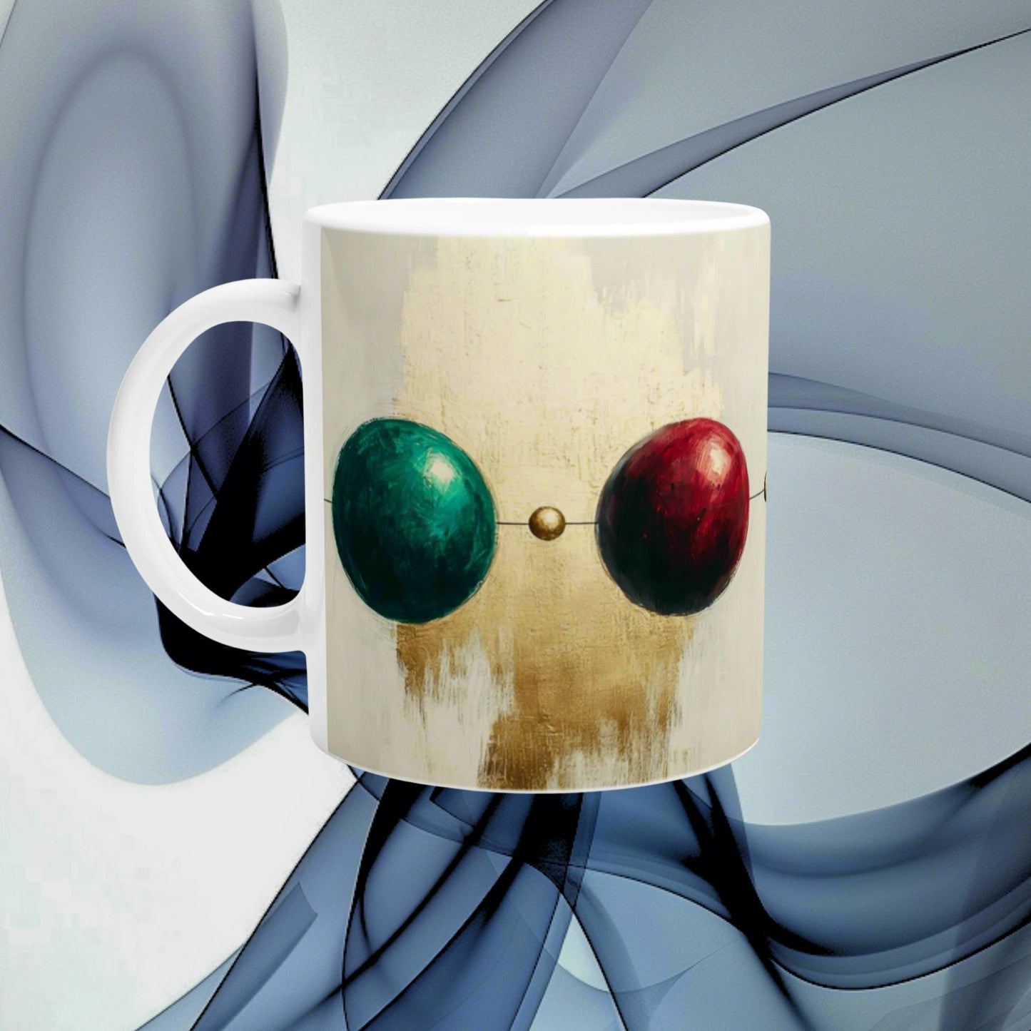 Product mockup: ceramic mug with abstract art of two connected spheres via a thin line—green left, red right.