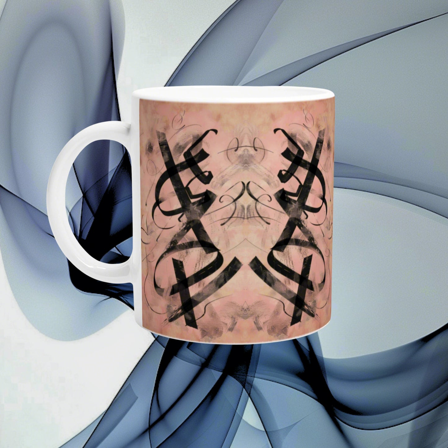 Product mockup: white mug with pink wraparound design featuring mirrored black ornamental flourishes.