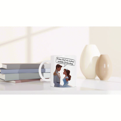 Product mug mockup featuring a cartoon couple in formal attire and a German speech bubble, set on a white shelf with books and vases.